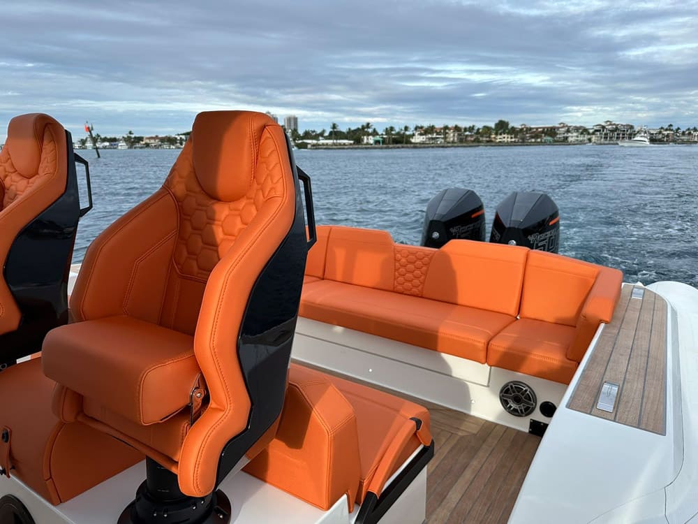 Explorer 40S orange seating & twin Mercury 500R outboard engines at the Miami International Boat Show